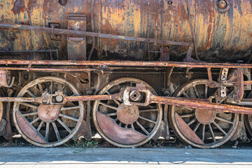 Steam locomotive in very bad condition, completely rusty and abandoned on the unused tracks at Uşak Rail way station.