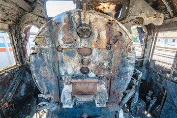 Steam locomotive in very bad condition, completely rusty and abandoned on the unused tracks at Uşak Rail way station.
