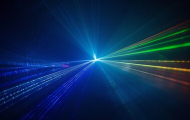 A blue and green laser beam with light rays of different colors on the right side, shining down onto an empty dark space