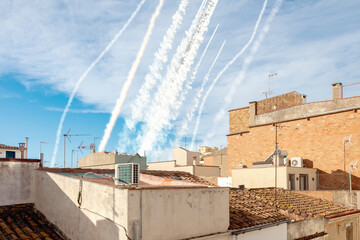 Israeli air defence system shoots down rockets, smoke from rocket launches. Concept: rocket attack,...