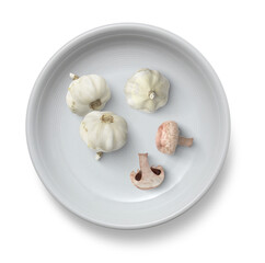 garlic and mushroom on a plate