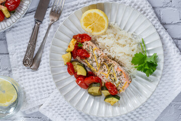 Oven baked salmon and vegetables with rice