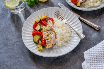 Oven baked salmon and vegetables with rice