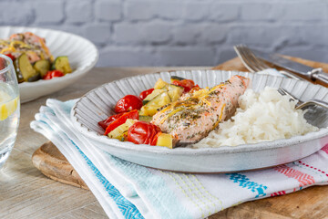 Oven baked salmon and vegetables with rice