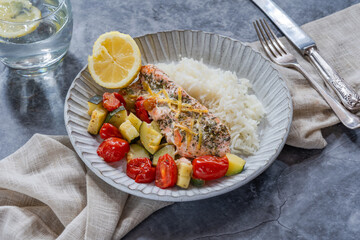 Oven baked salmon and vegetables with rice