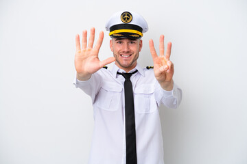 Airplane caucasian pilot isolated on white background counting eight with fingers