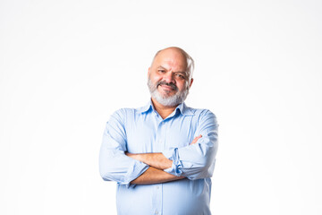 Cheerful senior Indian asian old age senior man looking at camera against white