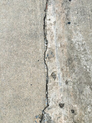 old stone wall, cracked road