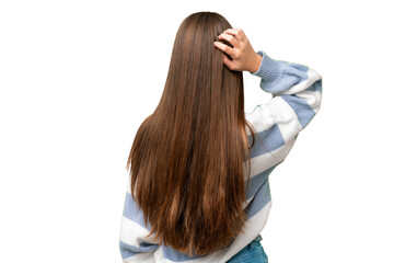 Teenager girl over isolated chroma key background in back position and thinking