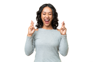 Young Argentinian woman over isolated background with fingers crossing
