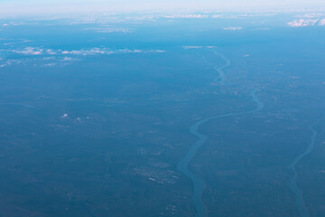 Aerial view of river flowing through a picturesque landscape