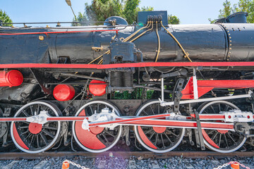 Steam locomotive in very bad condition, completely rusty and abandoned on the unused tracks at Uşak Rail way station.