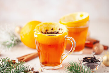 Black tea brewed in orange zest. Citrus hot drink