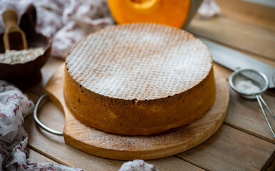 Delicious pie for breakfast. Sponge cake on a wooden table. Sweet pastries. Close-up