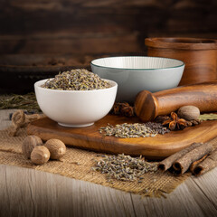 LAVENDER DRIED on wooden table background. Herbs, spices and dried food baking ingredient. Mortar and different spices. Cottage kitchen. Product Photography