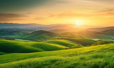 Fototapeta premium Landscape mountain with serene sunrise over the green hills