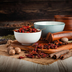Mizoram Birdeye Chilli Pods on wooden table background. Herbs, spices and dried food baking ingredient. Mortar and different spices. Cottage kitchen. Product Photography
