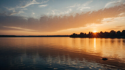 Fototapeta premium Peaceful calm sunset over the lake, river silhouette natural background