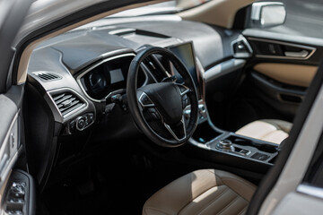 Car interior with steering wheel and front seats