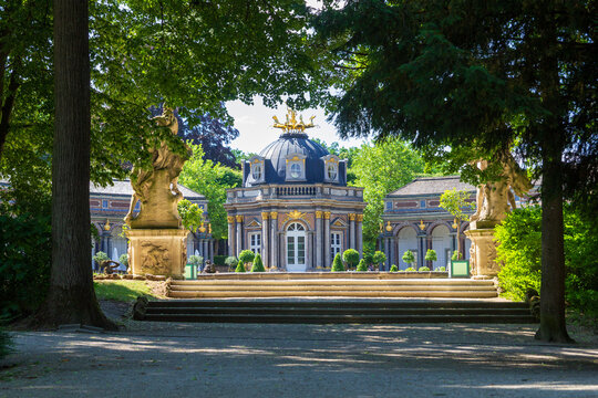 Bayreuth, Germany - June 13, 2023: New palace (sun temple) with statues in park at Hermitage (Eremitage) Museum in Bayreuth, Bavaria, Germany