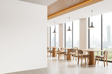 A modern cafe interior with wooden furniture, large windows, and a white blank wall, light setting, concept of contemporary design.  3D Rendering