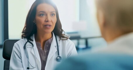 female doctor and patient discussing at clinics office. physician consulting woman about diagnosis