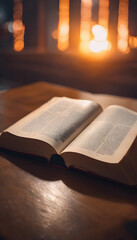 An open book on a wooden table with a warm, glowing background, possibly from a fireplace. Read a Book Day.