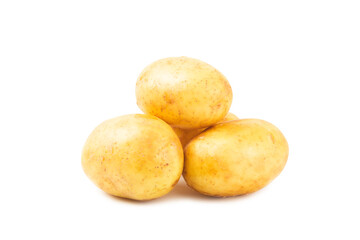 Young potatoes. Raw potatoes isolated on white background.Peel potatoes.Harvesting collection. organic, freshly dug potatoes. Agricultural background. Vegan. Vegetables.Potato slices.