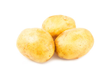Young potatoes. Raw potatoes isolated on white background.Peel potatoes.Harvesting collection. organic, freshly dug potatoes. Agricultural background. Vegan. Vegetables.Potato slices.