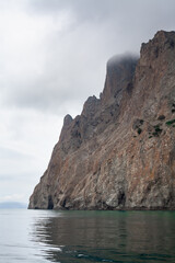 Seascape with majestic mountains.