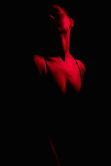 Beautiful woman in red color. sexual young Body silhouette