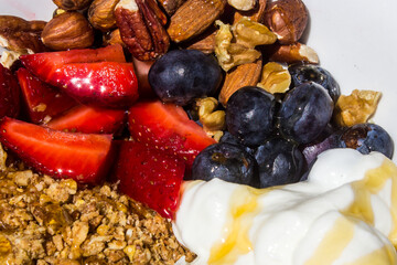 Blueberries, nuts and Yogurt drizzled in honey