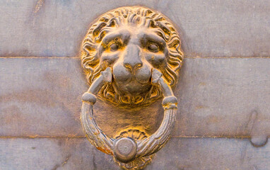 lion head knocker, Lecce, Apulia, Italiy, March 2024