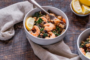 Prawn and chorizo risotto with black beans and calvo nero