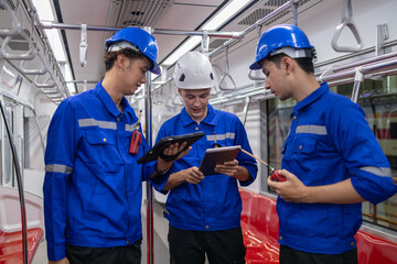 Transit Workers Analyzing Data Inside Train.