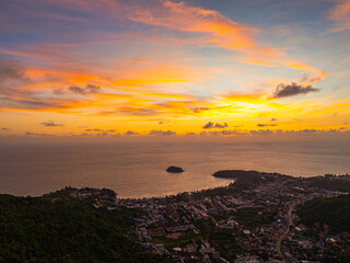aerial view colorful cloud in sunset looked strangely beautiful. Horizon dramatic twilight sky and cloud sunset background. amazing sky at sunset scenery sunset above the island at Kata beach Phuket.
