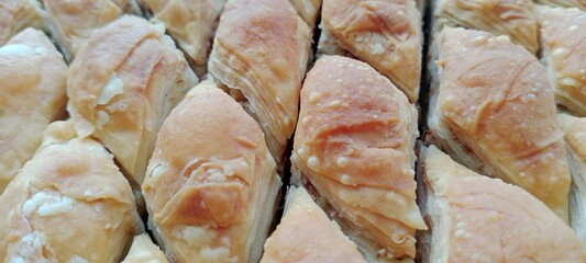 Turkish dessert baklava with sherbet on a tray