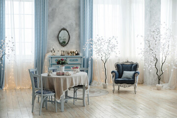 Charming vintage living room with pastel blue furniture, elegant table setting, decorative mirror, and soft lighting. Perfect for promoting home comfort, decor ideas, and elegant living