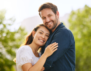 Fototapeta premium Couple, hug and love in garden portrait, connection and romance in relationship or affection. People, safety and embrace for commitment to marriage in outdoor nature, support and date in countryside
