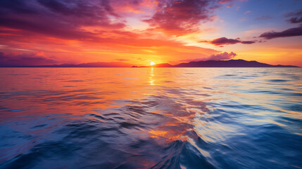 Obraz premium Mesmerizing Sunset Over Tranquil Sea with Radiant Colors