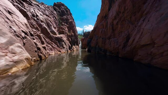 scenic arizona canyon waterfall aerial view and fly through fpv drone