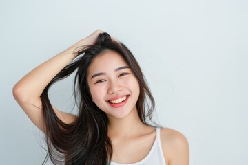 Fototapeta premium Beautiful young asian woman with clean fresh skin on white background, Face care, Facial treatment, Cosmetology, beauty and spa, Asian women portrait.