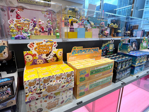 famous mystery box or blind box of Pop Mart character of Teletubbies x Pop mart and many cute collections from China are display on shelf in Popmart store toy shop in Tokyo, Harajuku Japan