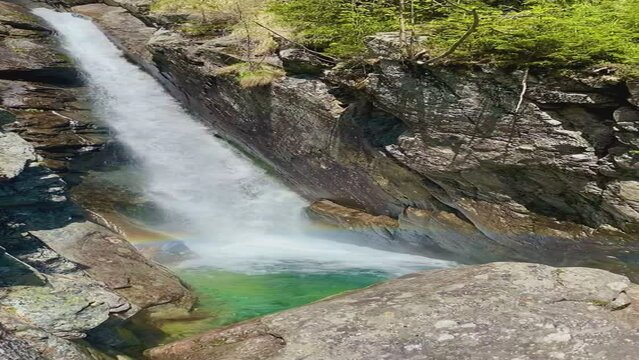 waterfall in the mountains. Waterfall in a mountain gorge. High Tatras