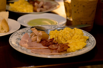 A delicious breakfast of ham, eggs, and toast is a great way to start your day.