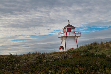 View of a beautiful lighthouse at the Prince Edward National Park, in the Prince Edward Island,...
