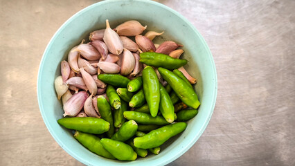 Chili and garlic in a bowl on the tableware