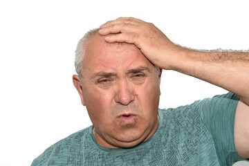 Portrait of a man with an expression of pain on his face.