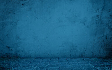 blue concrete perspective room for advertising. stamp concrete floor in grid pattern with weathered navy concrete wall background. blue backdrop space for displayed product.