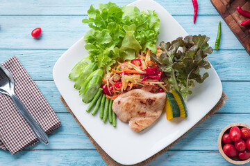 Thai Papaya Salad with Grilled Chicken Breast.